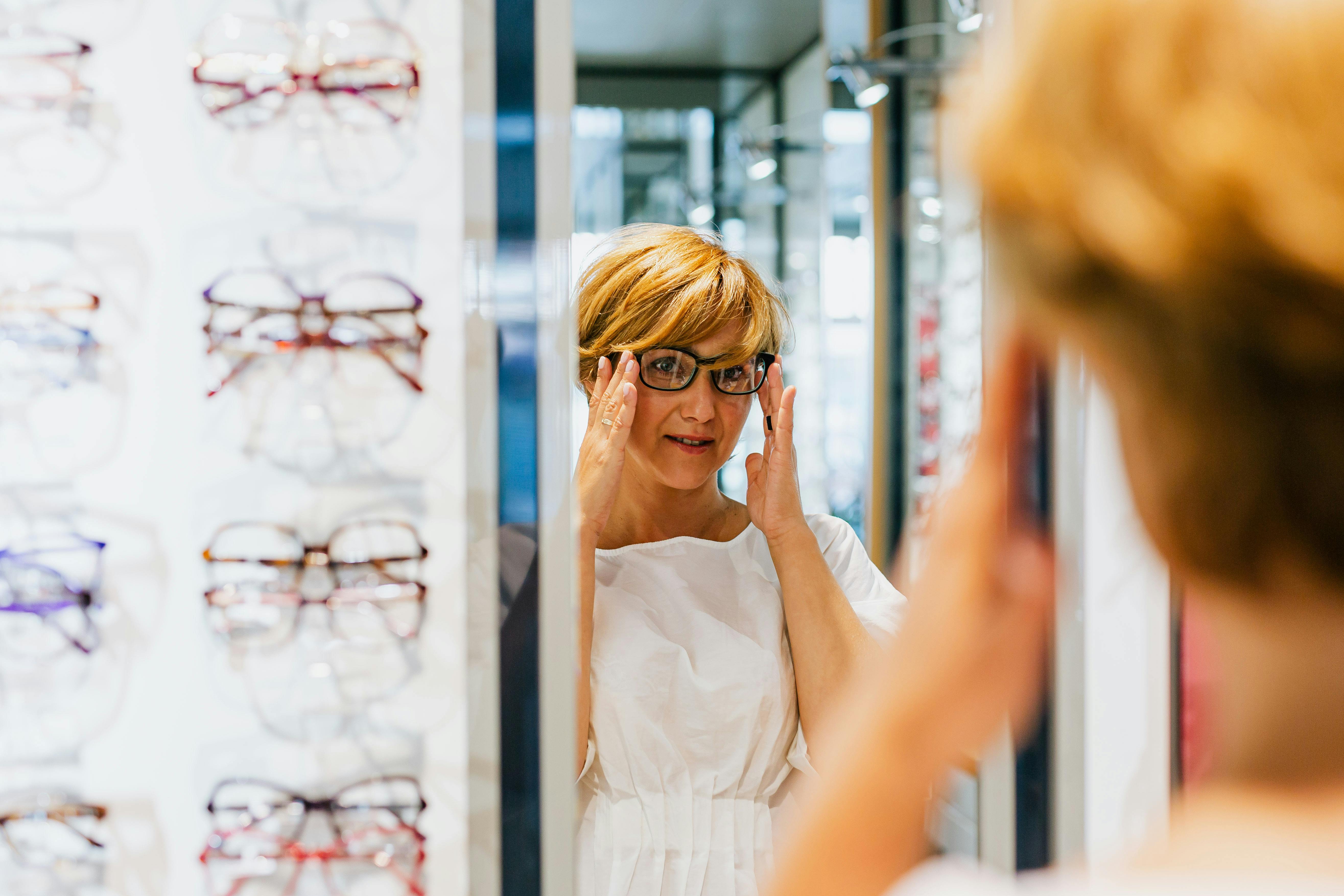 Patient choosing glasses during a personalised vision consultation